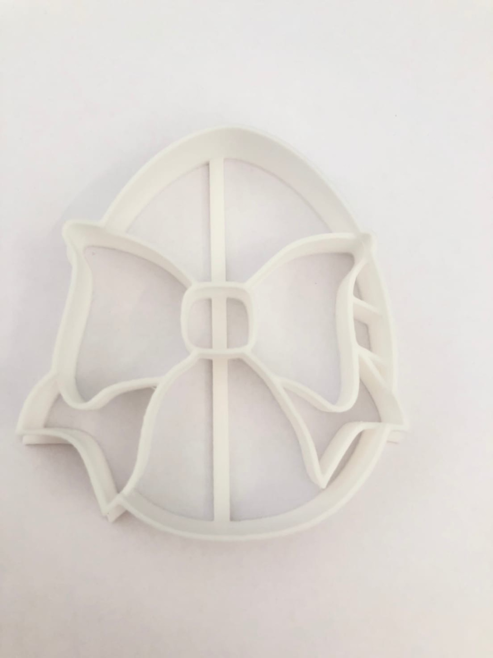 картинка Форма для пряников Яйцо с бантиком высота 8,5 см, толщ 1,5 см от магазина Одежда-